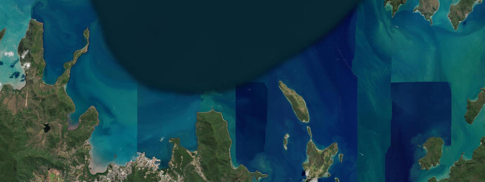Satellite view of the coast near Airlie Beach
