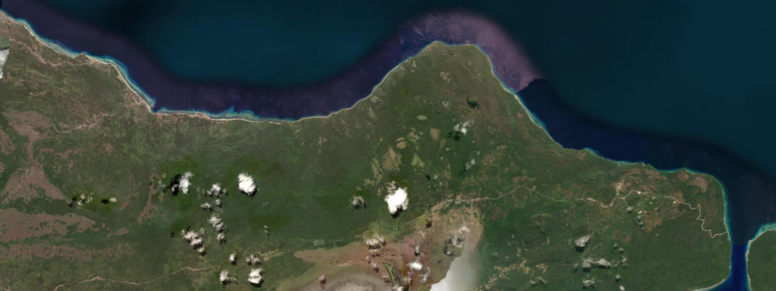 Satellite view of the coast near Com
