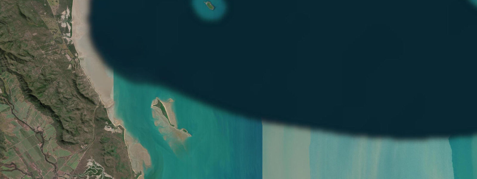 Satellite view of the coast near Flock Pigeon Island