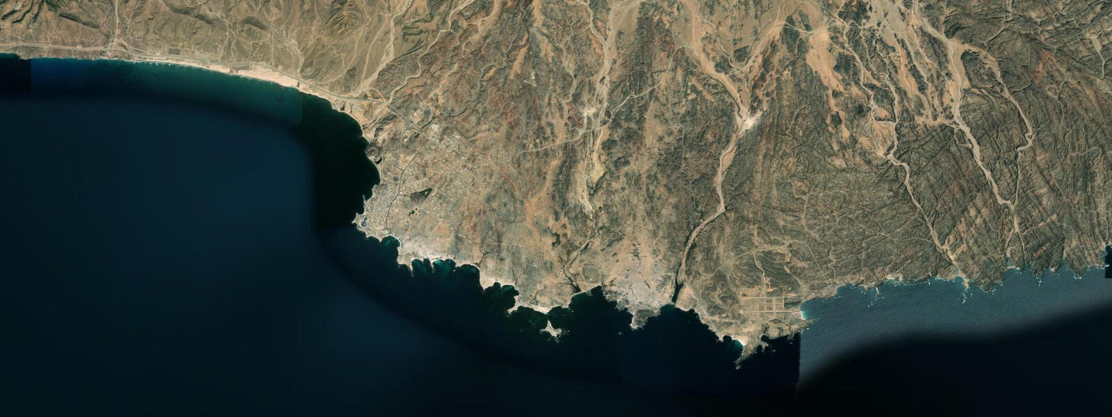 Satellite view of the coast near Mirbat