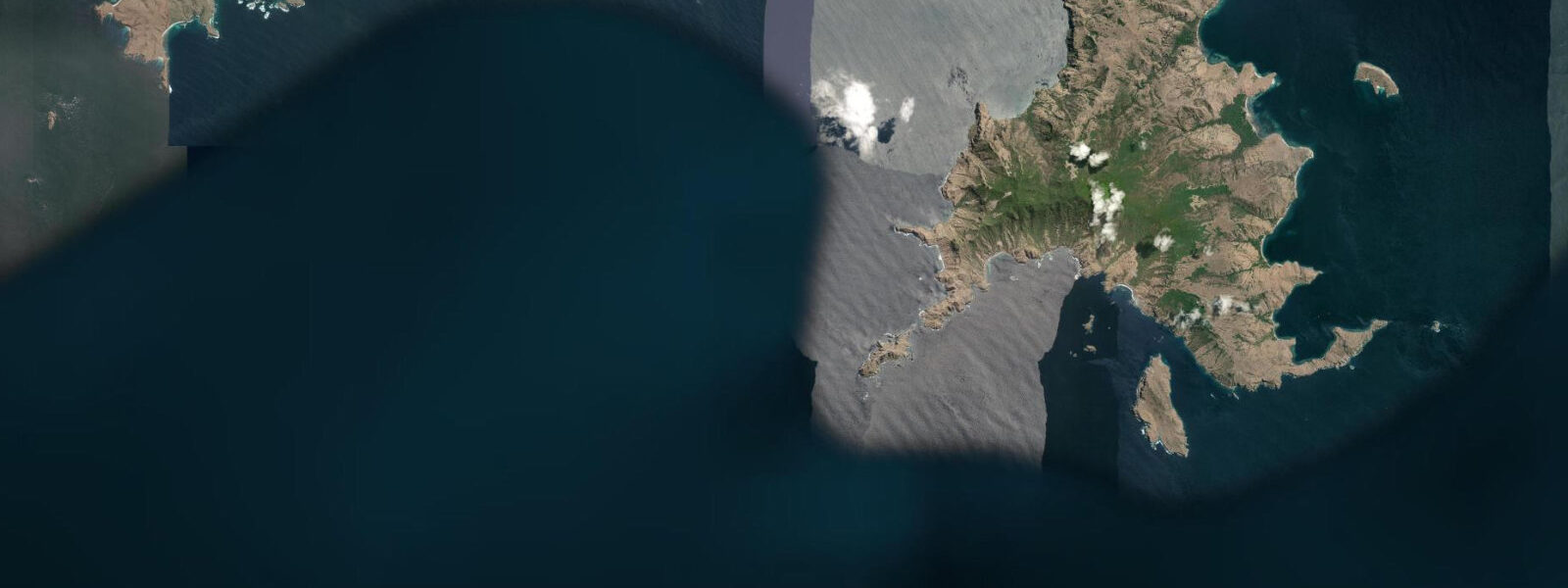 Satellite view of the coast near Pink Beach Flores