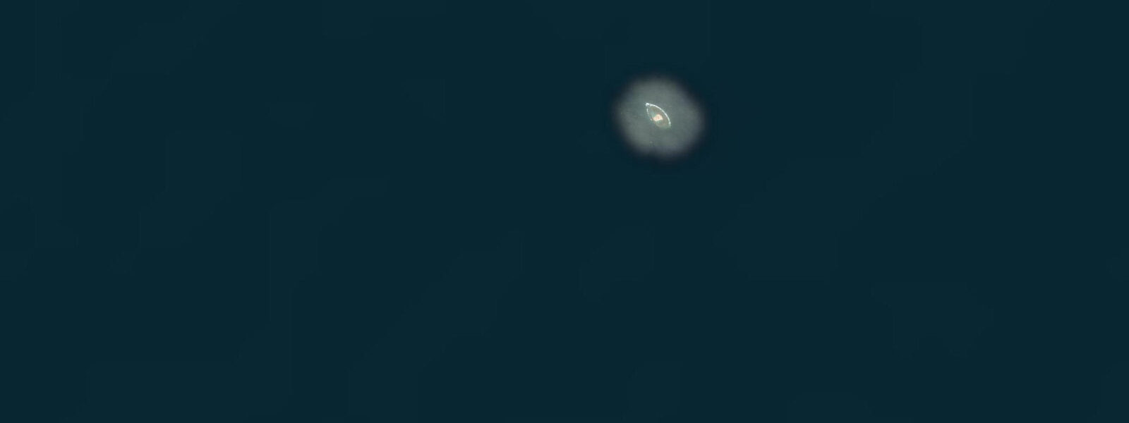 Satellite view of the coast near Qaruh Island