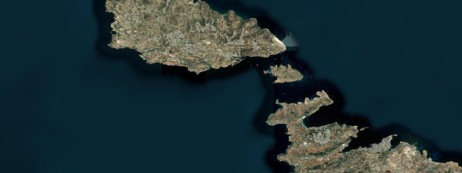 Satellite view of the coast near Xlendi